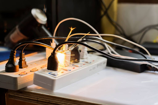 Overloaded outlet catches on fire